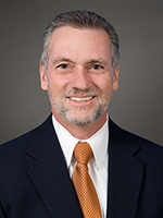 An image of Trellis Foundation Board Member Dr. Richard Rhodes.