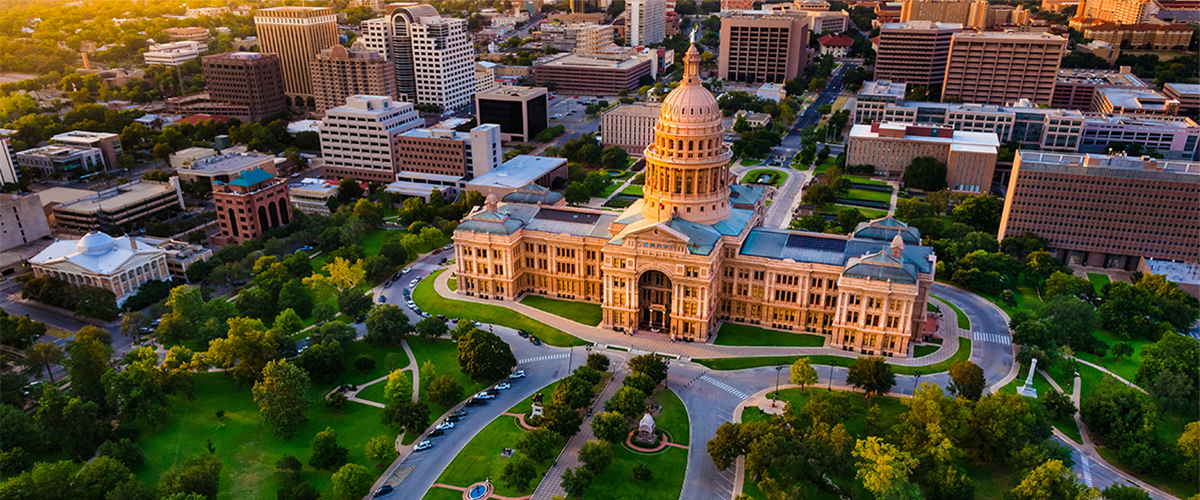 An aerial view image of the Texas state capitol.